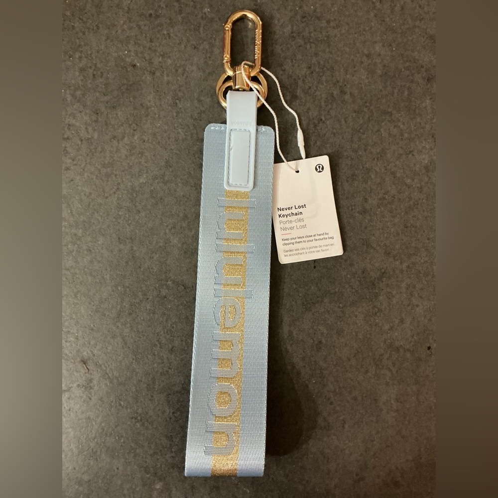 Lululemon Athletica Light Blue and Gold Never Lost Keychain